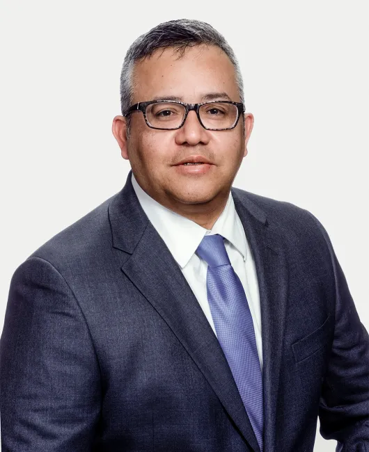 headshot of conrad garcia, williams mullen partner